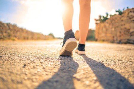 A person walking down a path