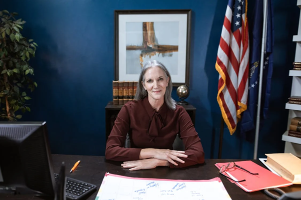 Timeshare lawyer consulting a client in an office setting